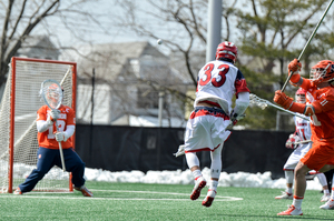 Evan Molloy made several stops down the stretch to pick up No. 6 Syracuse on Saturday.